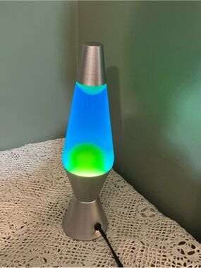 Lava Model 2124 Motion and Glitter Lamp Silver Base Blue Liquid 25W 120V